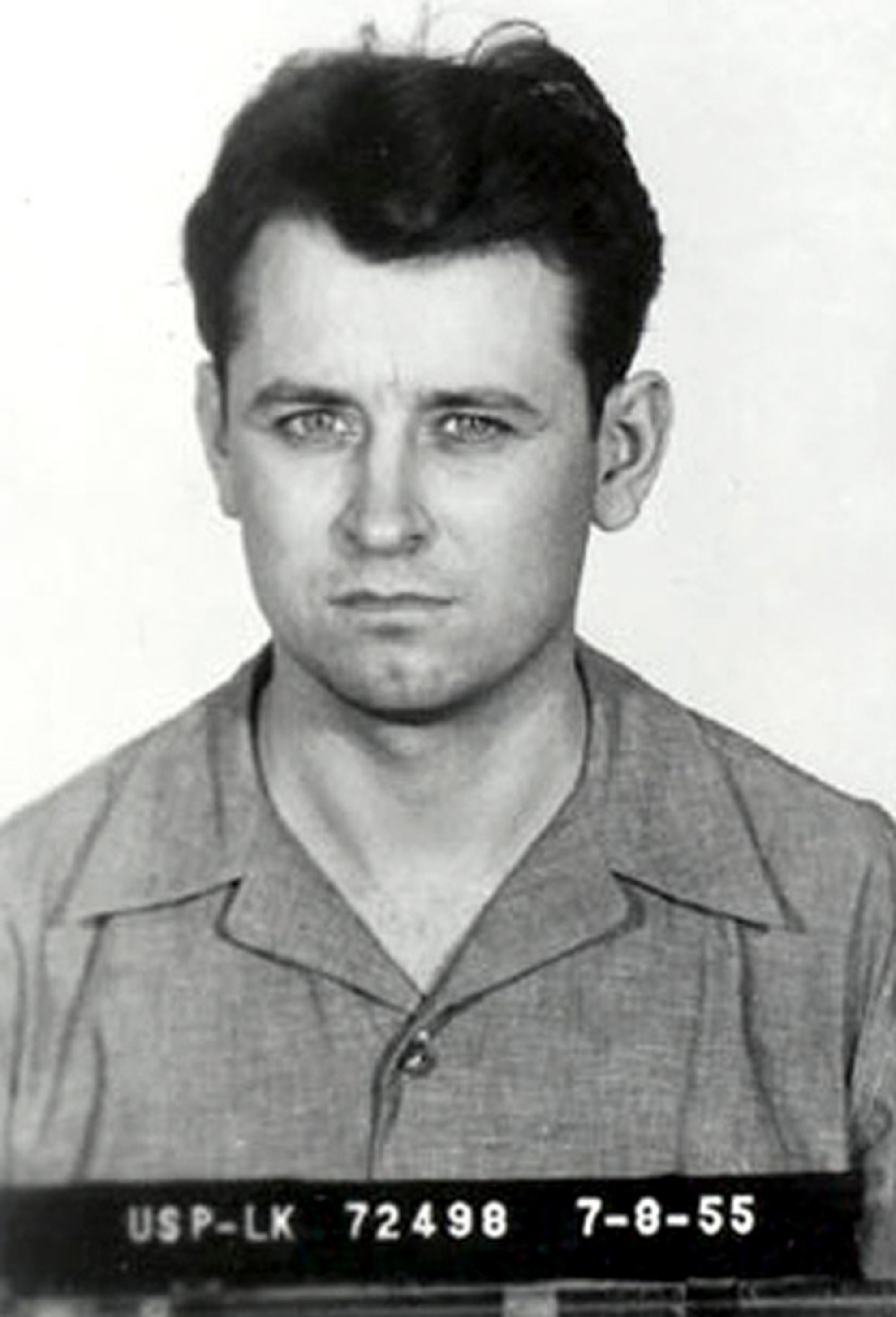Black-and-white 1955 police booking photograph of James Earl Ray