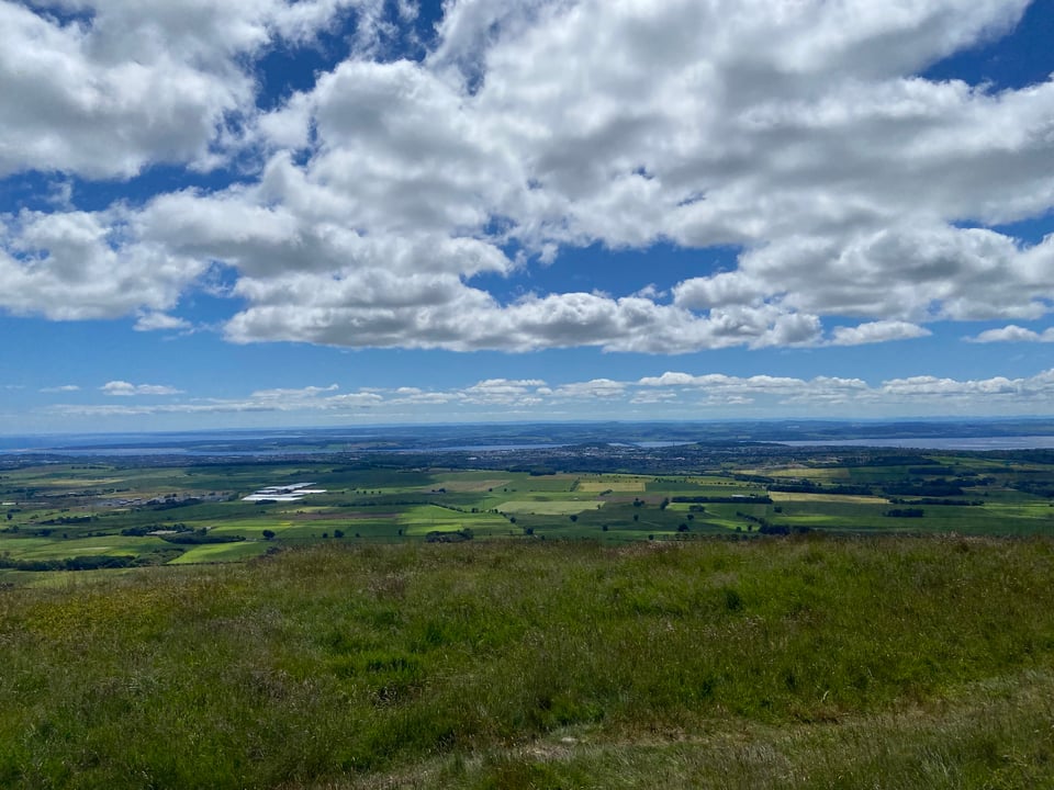 the view from the top of Tealing hill across Southern Angus, East Fife and possibly as far as Lothian