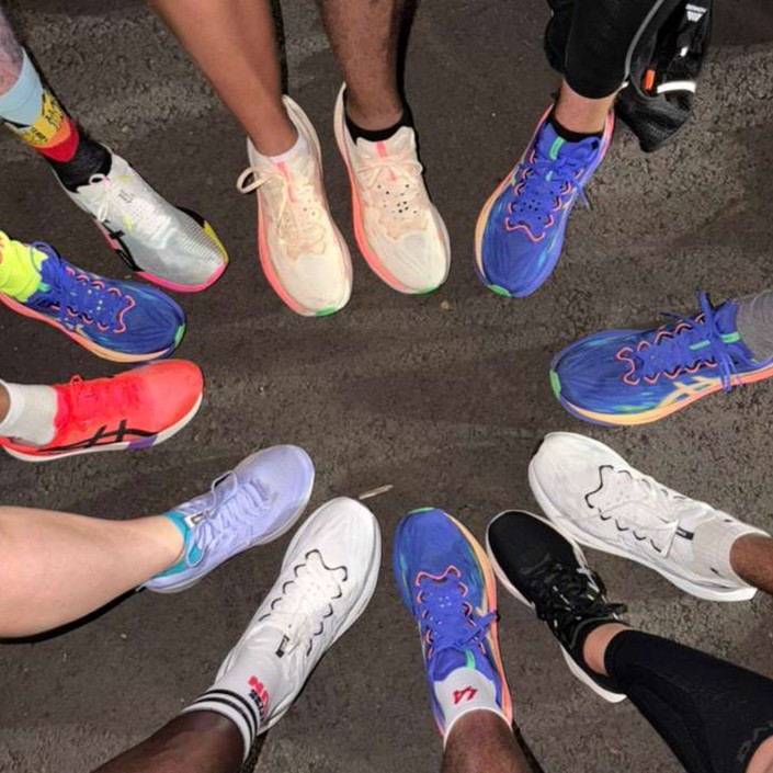 A bunch of our Asics shoes in a circle, pre-race.