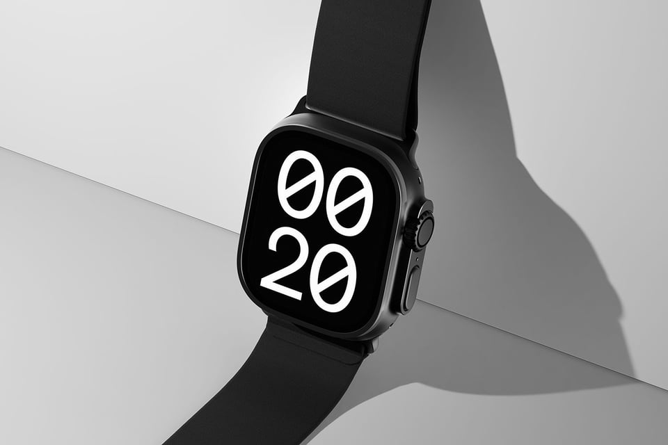 Apple watch ultra leaning against a wall