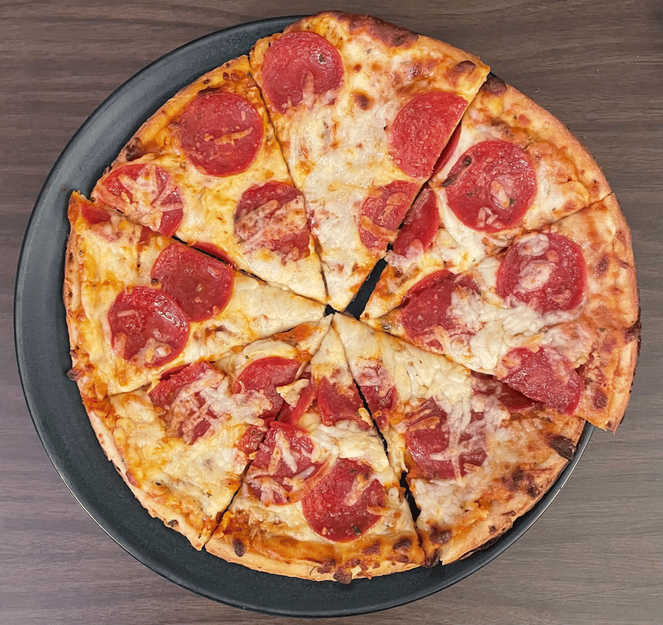 A close-up photo of a delicious frozen pizza as seen from above