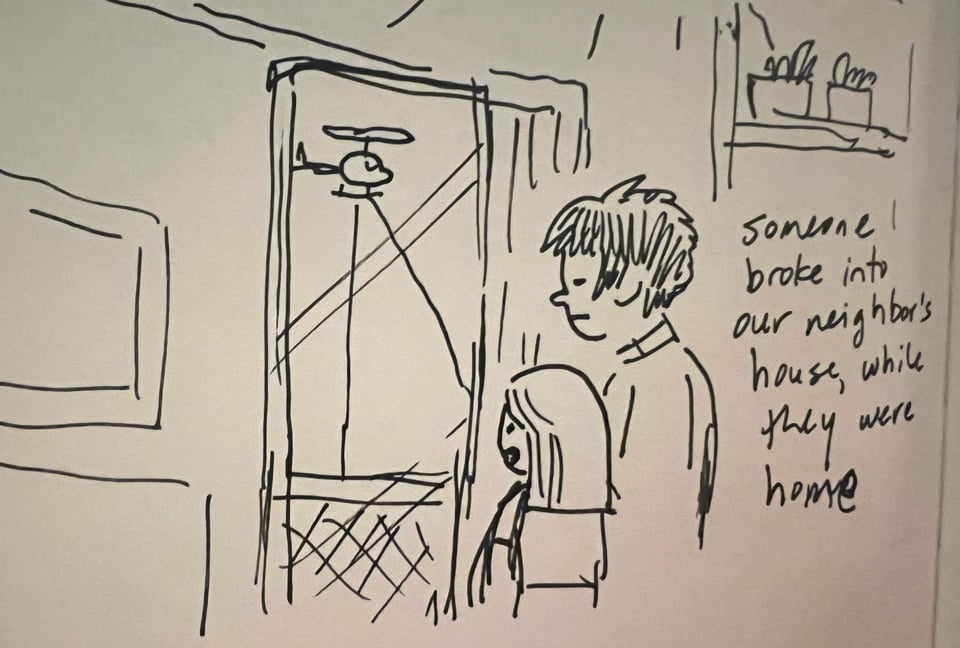 me and my daughter looking out the back window at a helicopter shining its light
