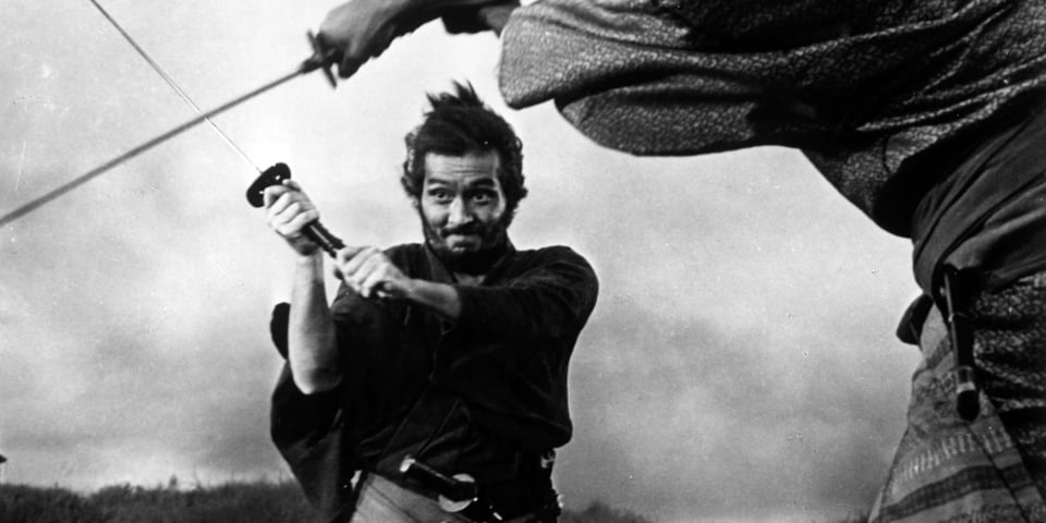 An intense sword battle between two samurai.