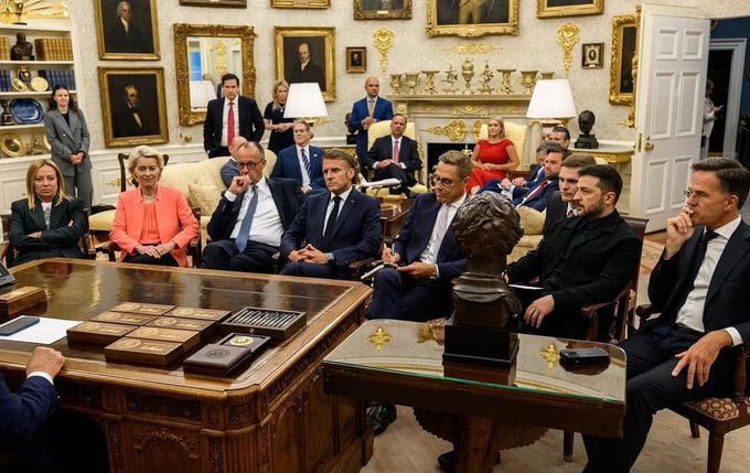 European leaders gathered around President Trump’s desk.