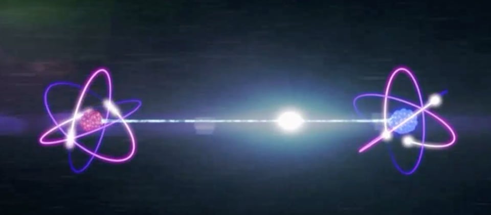 Two atoms with electrons whizzing around them are linked by a white laser, with a glowing dot on the laser line closer to one of atoms like a tiny sun.