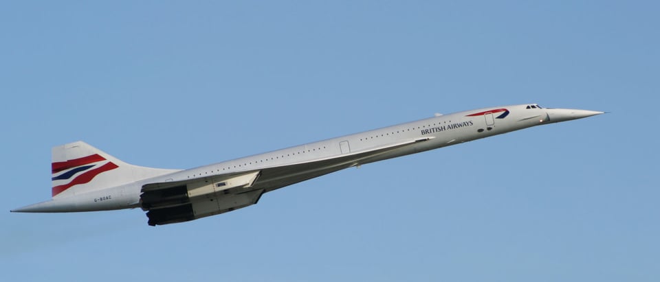 An image of a Concorde in British Airways livery climbing against a blue sky