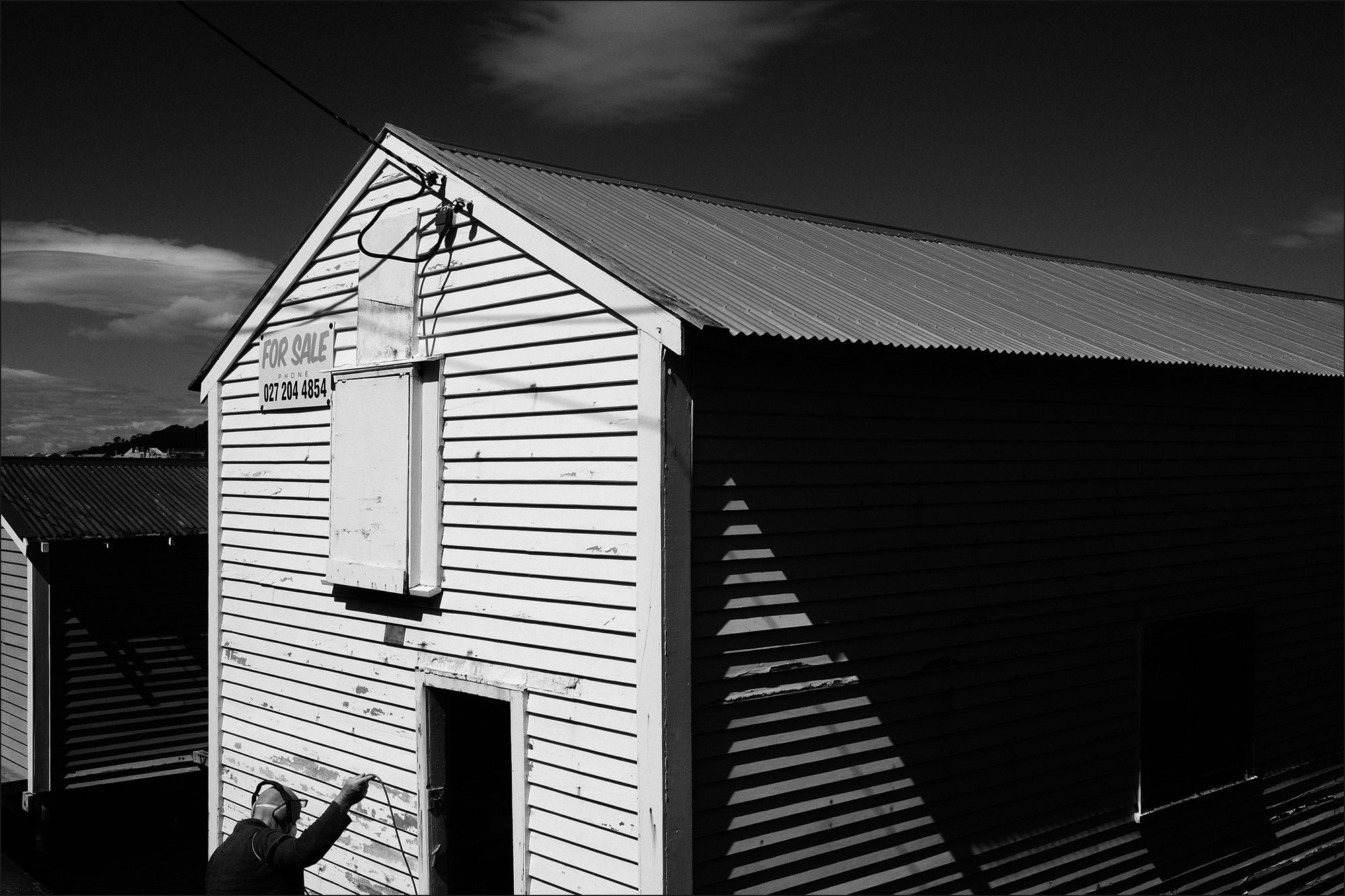 Photo of a boatshed being prepared for sale.