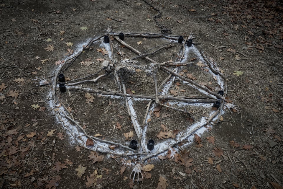 skeleten inside a salt circle pentagram
