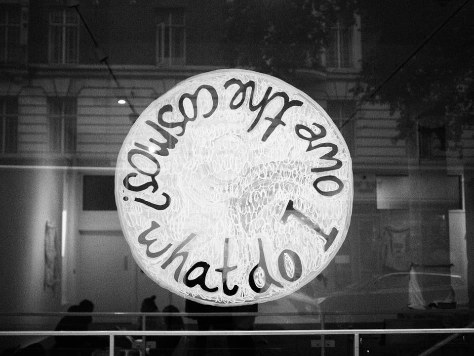 What Do I Owe The Cosmos - painted sign on the gallery