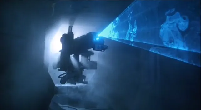 A robotic camera scans the adrift spaceship Narcissus