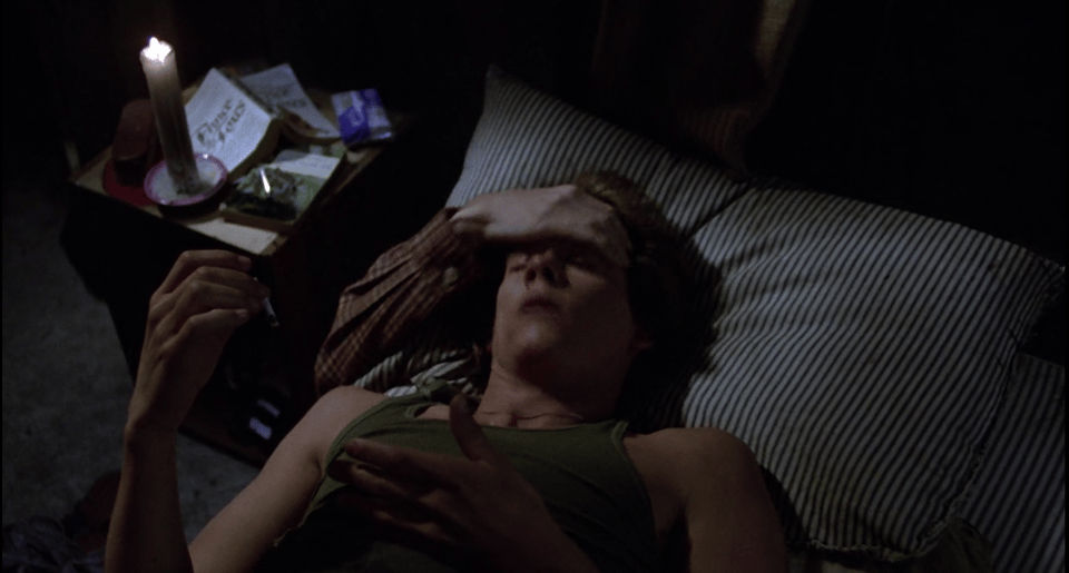 Jack, after having sex with his grilfriend, lays back in the bare twin-sized bed to enjoy a smoke. A drop of blood hits his face and immediately after a hand slaps over his forehead. Not a great way to go out, honestly.