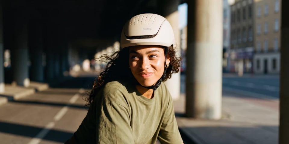 A cyclist wearing a headfirst helmet.