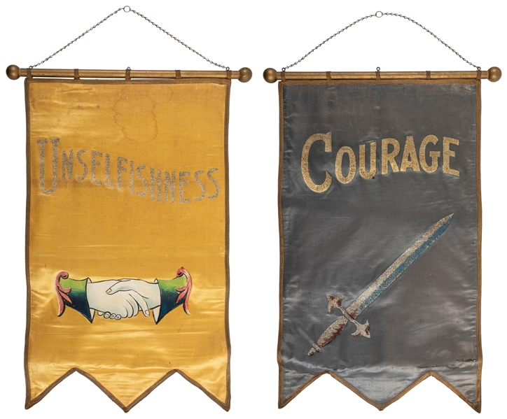Banners reading "UNSELFISHNESS" and "COURAGE"
