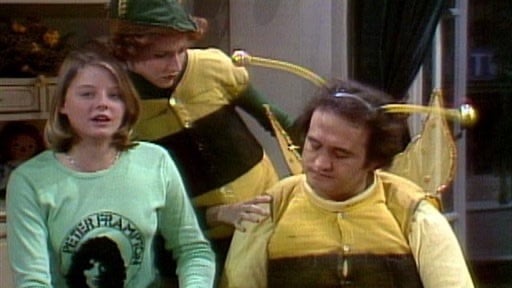 a group of people dressed as bees