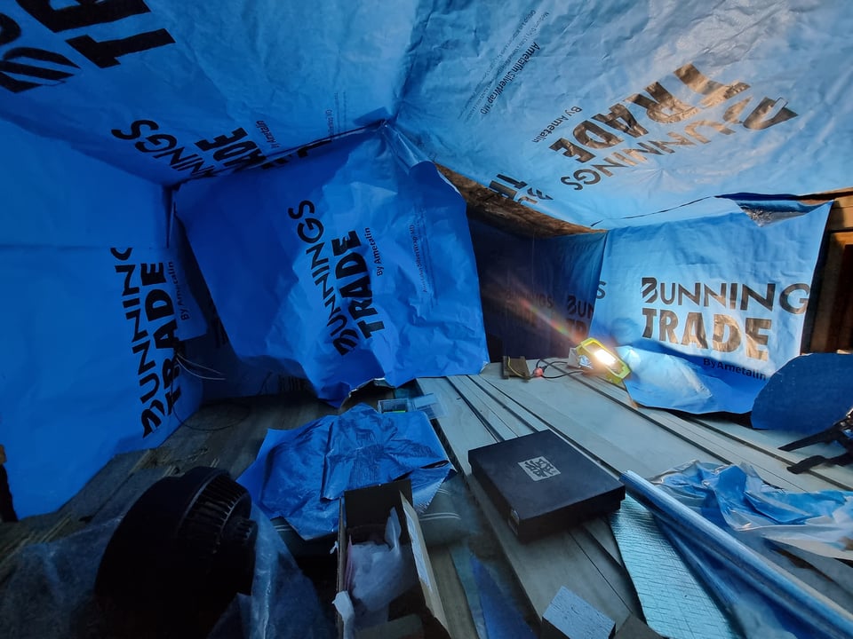 Loft room insulated covered in blue sarking