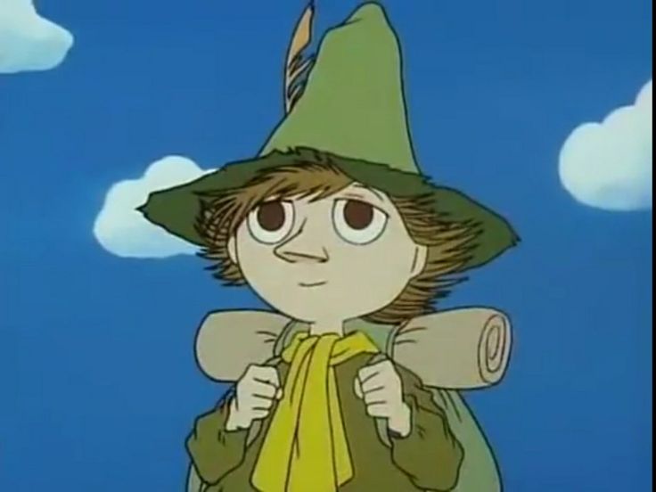 A picture of Snufkin, a character from Moomin. Snufkin is a humanoid wearing green clothing and a backpack with a bedroll. He is looking off into the distance.