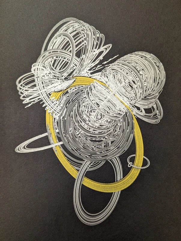 Gold and silver design on black paper with hundreds of intertwined circles in 3D space