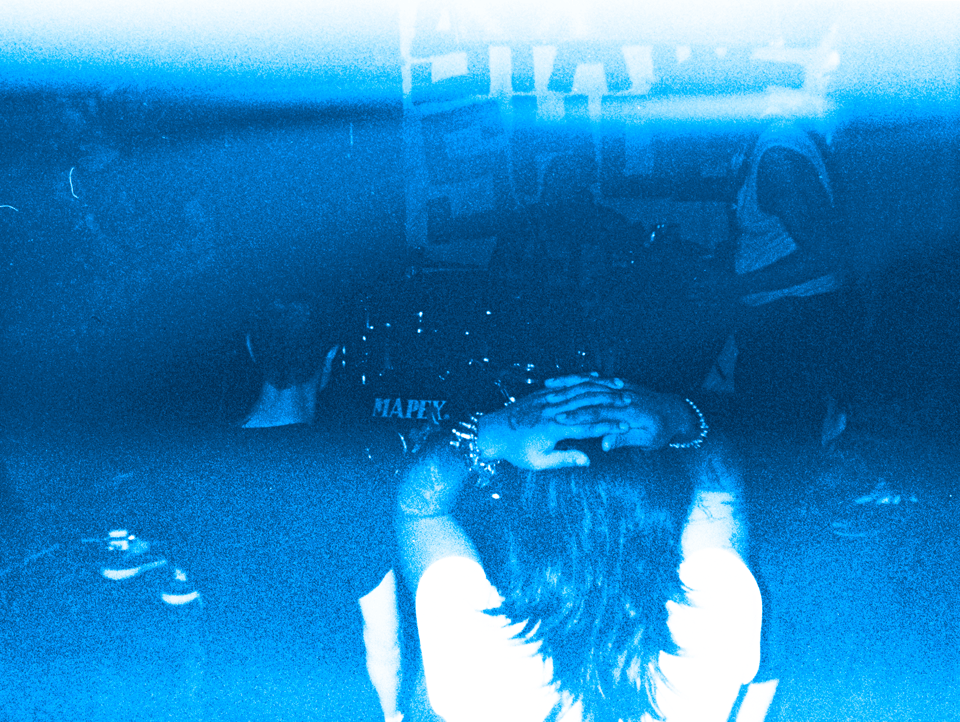 110 photo of Static Shock at New River; in the foreground someone has their hands on their head in a 'this is abrasive' sort of way