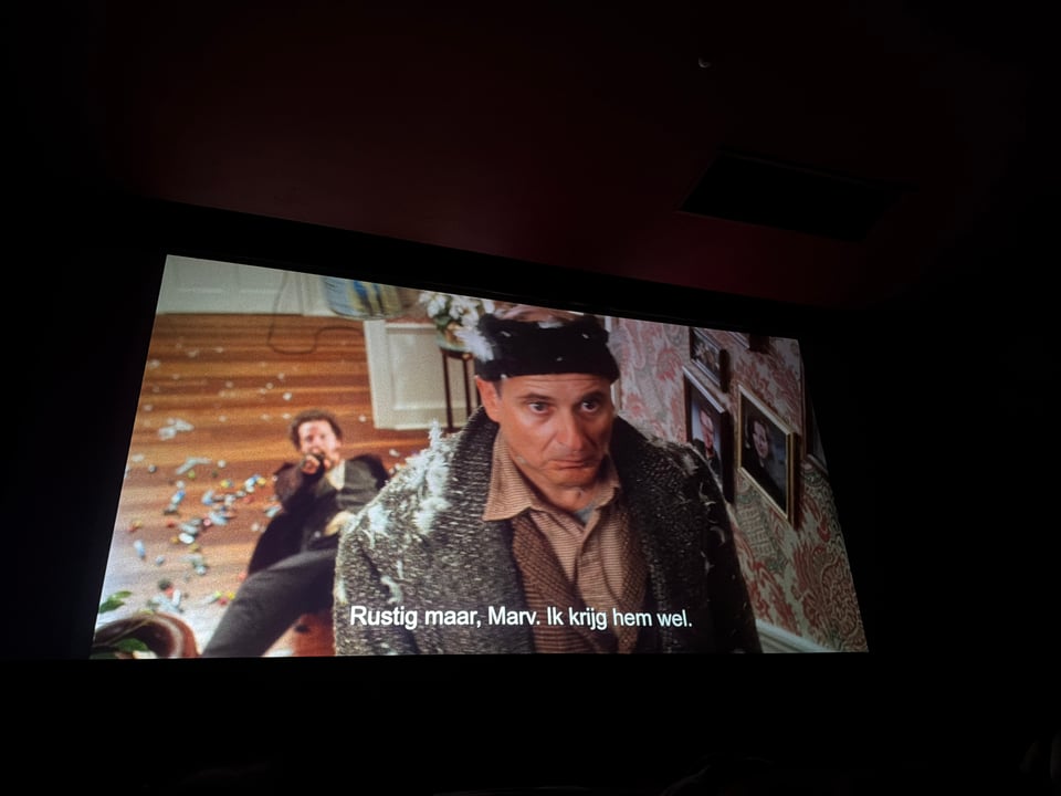 Harry is going up the stairs and tells Marv he will get the kid.