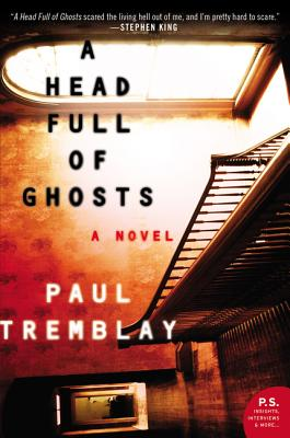 The cover of Paul Tremblay's novel A Head Full of Ghosts, Red-tinged image of the interior of a suburban house, at an odd angle.