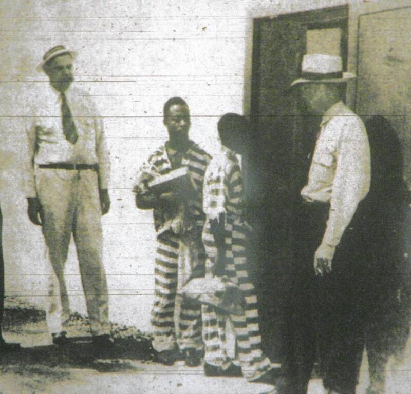 George Stinney (second from right) and Bruce Hamilton (second from left) are led to the execution chamber
