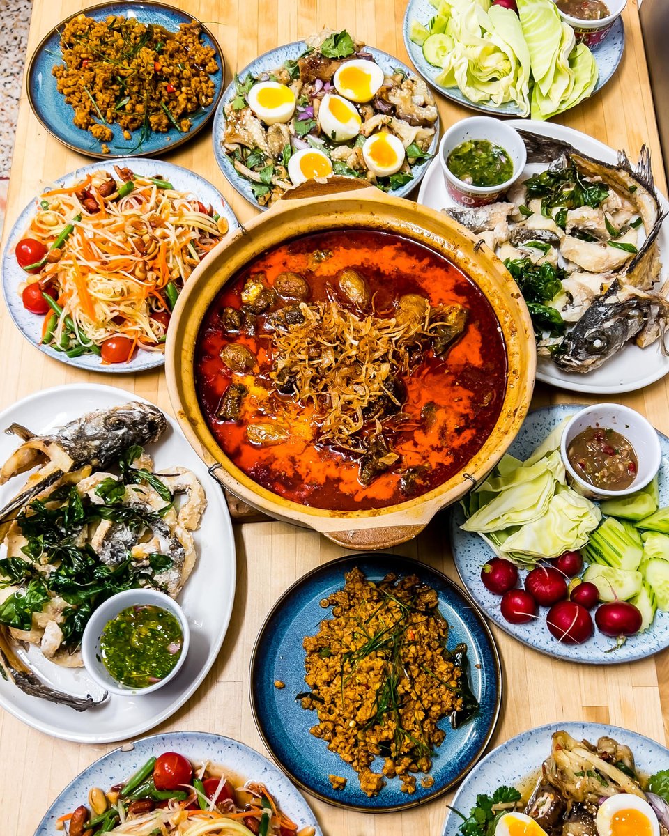 An array of dishes of thai food.