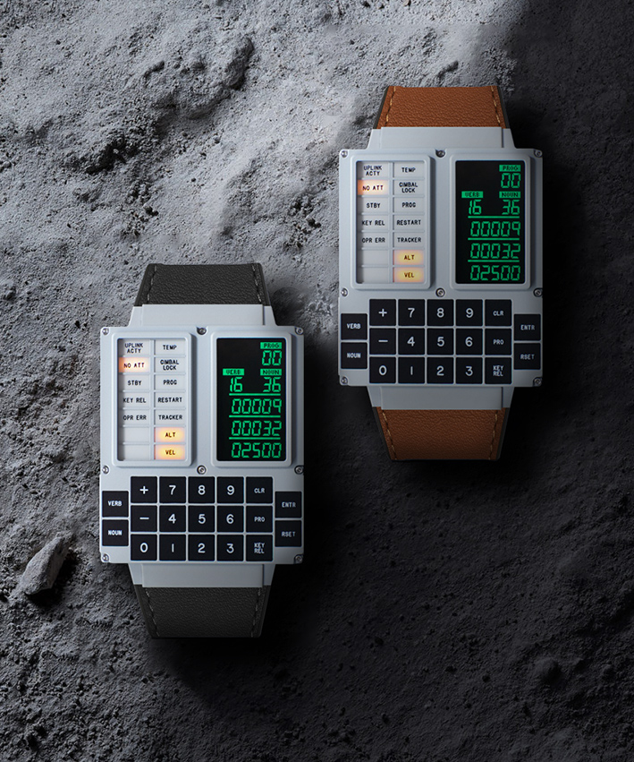 A picture of two curious looking watches, side-by-side. Each watch is identical except for the color of the strap; one has a black strap, one has a brown strap. The watch itself is rectangular, chunky, with the bottom half covered by large square black buttons Showing the numbers from 0 to 9, as well as a plus sign, a negative sign, and several small words that are not easily visible. The top half of the watch has, on the right hand side, a tall rectangular black screen showing bright green LED numbers. Next to it are a handful of pretty, lit buttons. The whole thing looks very retro – as if it had been created in the 1960s.