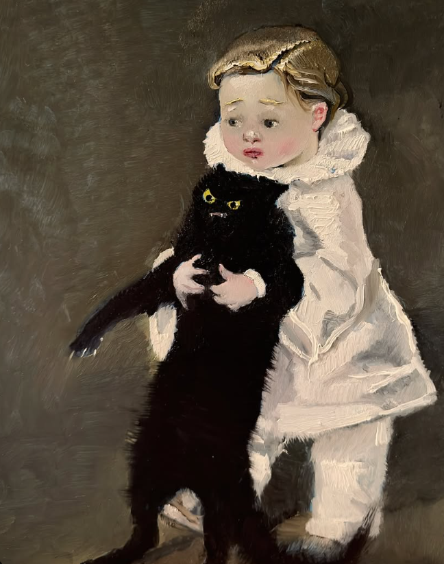An image of a toddler holding a black cat