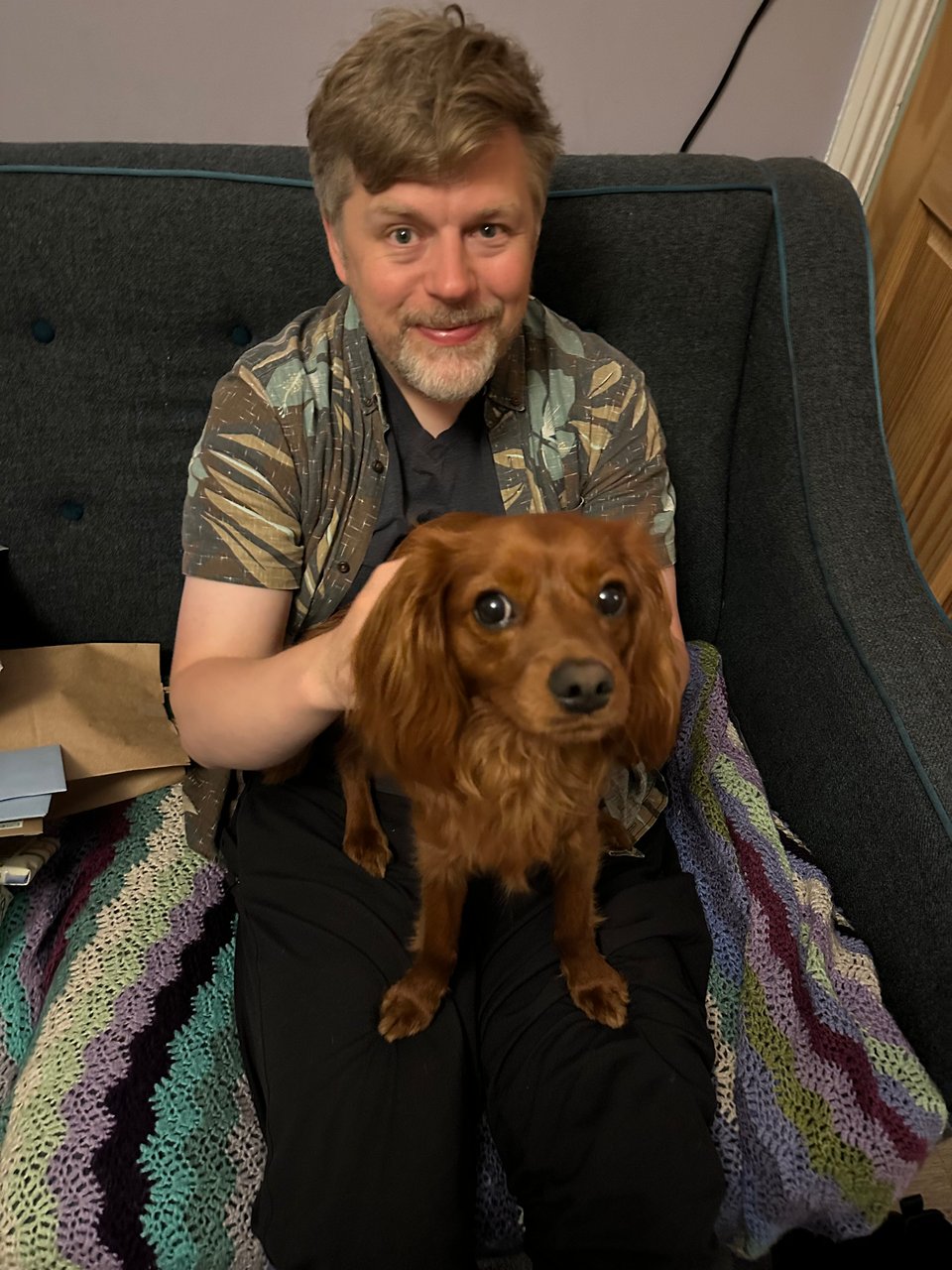 Radio sits on my lap looking like an awesome chap.