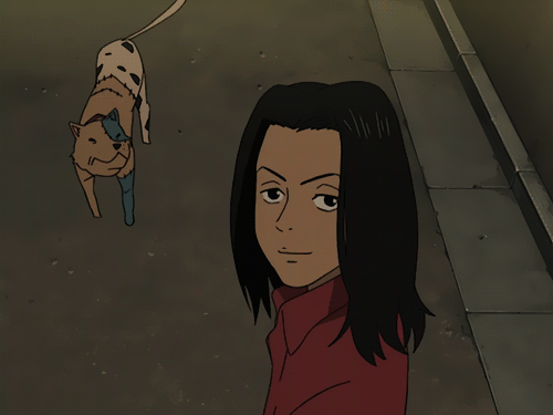 An animated GIF of a character from the anime series "Beck" flashing a peace sign while a dog barks behind him.