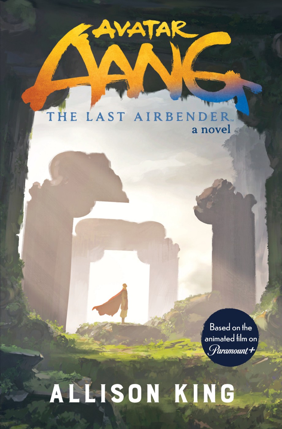 An adult Aang stands as a small figure among the ruins of the Southern Air Temple