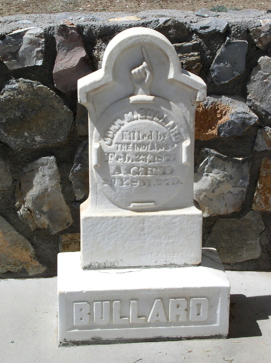 a white memorial to the founder of Silver City John M Bullard, killed by Indians in 1871