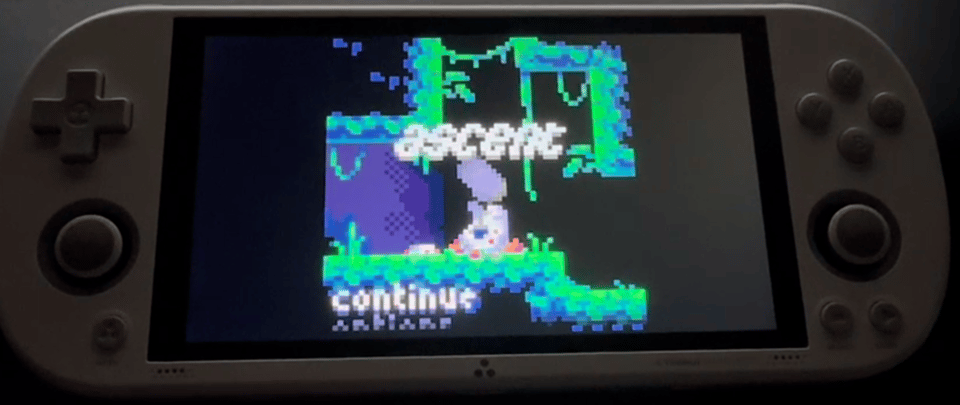 Title screen of the game Ascent DX running on a handheld.