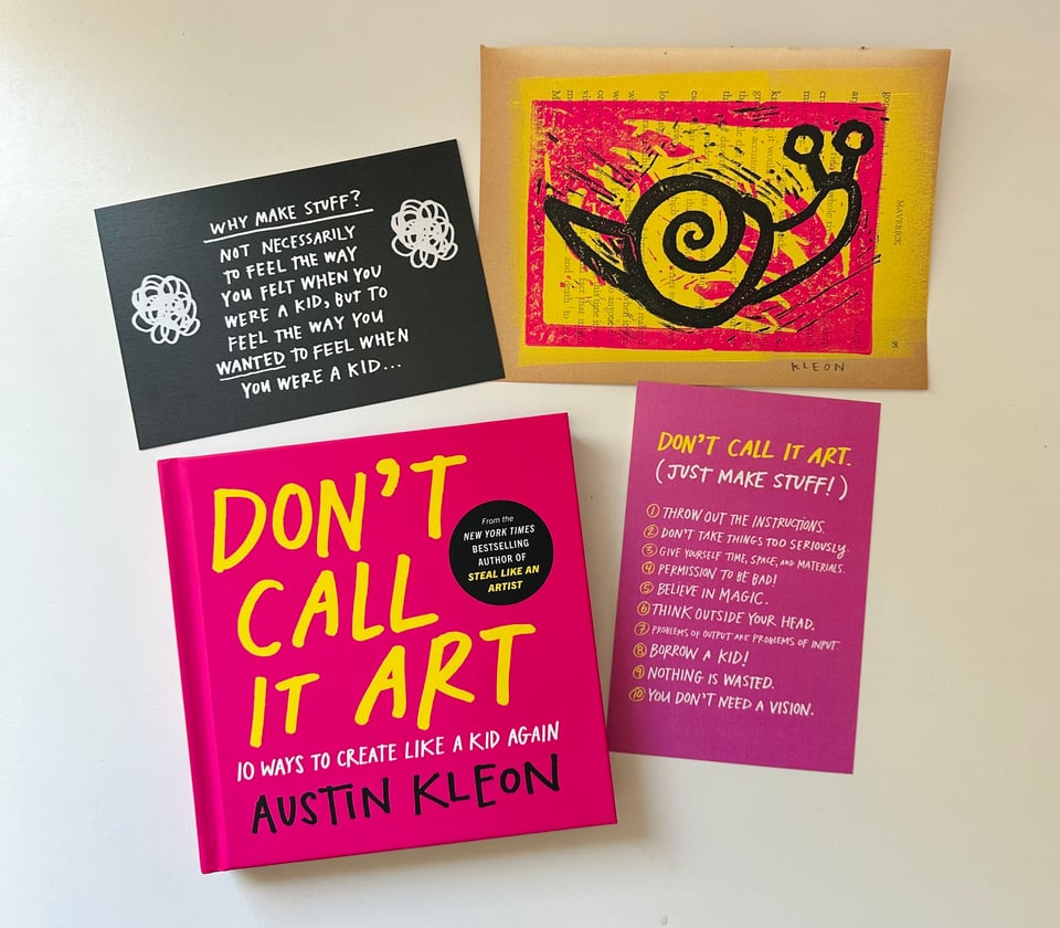 copy of book, two postcards, and a print of a snail from austin kleon's book launch