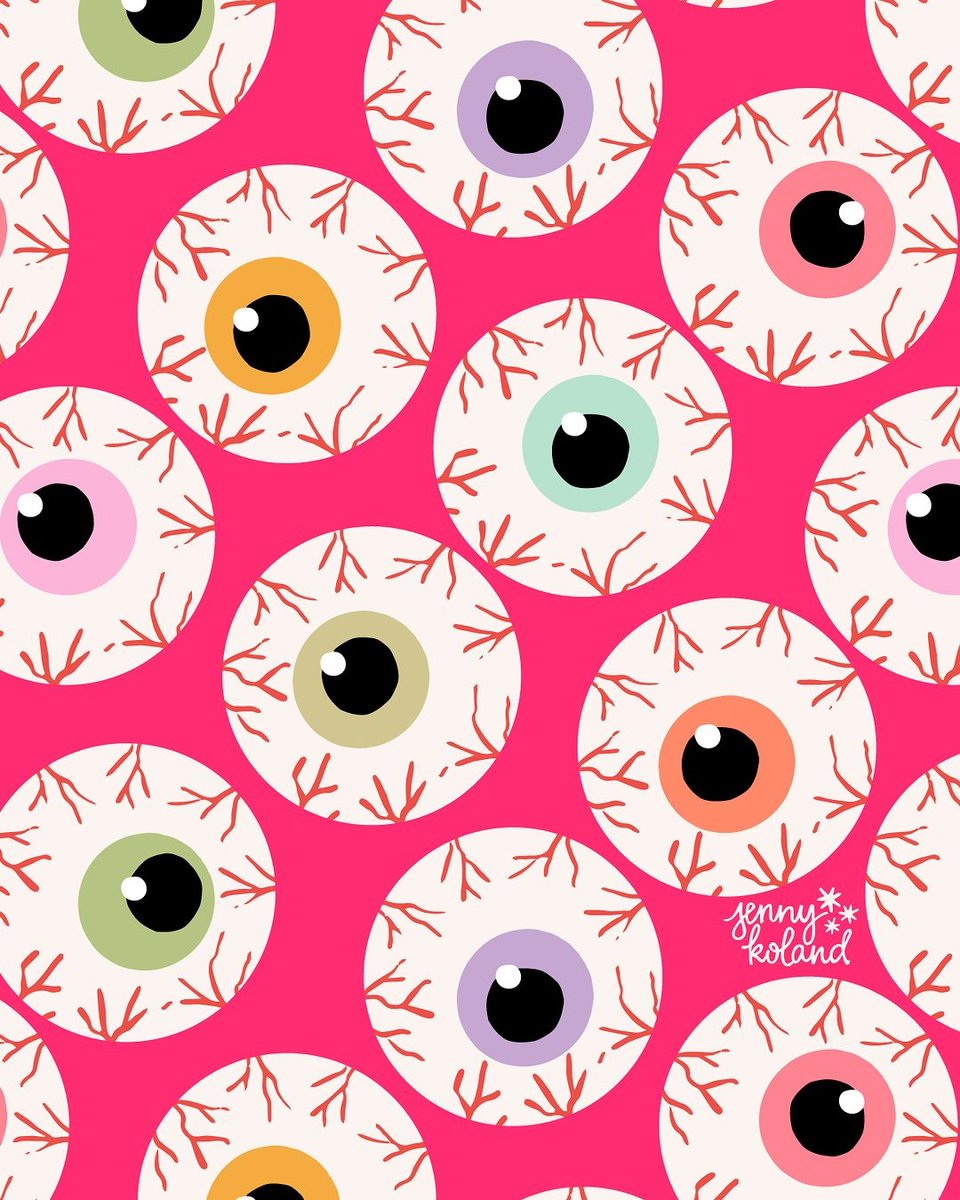 An illustration of various colored eyeballs on a hot pink background