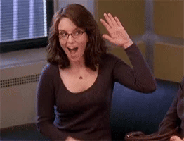 Tina Fey high fives herself heartily