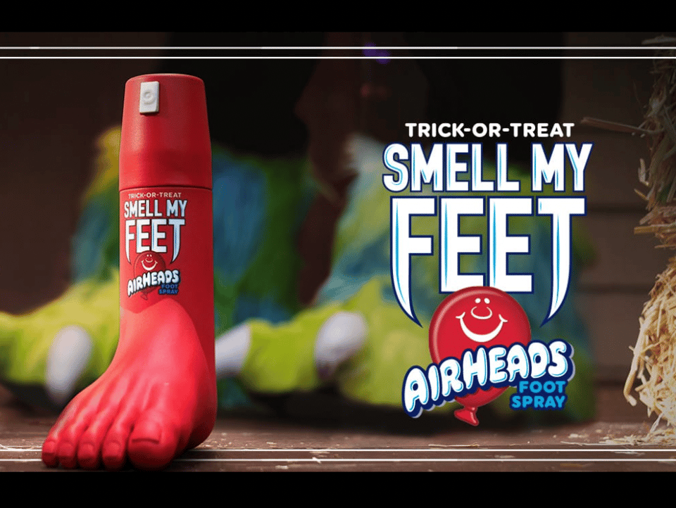 An ad for "Airheads Foot Spray" reading "Trick of treat, smell my feet"